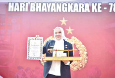 Bupati Musi Rawas Hj Ratna Machmud Dapat Pengharagaan dan Pin Emas dari Kapolri
