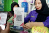 Belanja Praktis dengan QRIS di NKHZ Baby Shop, Tumbuh Berkembang Bersama QR Code BRI