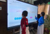 Siswa di Lubuk Linggau Belajar Interaktif Pakai Smartboard TV Bantuan Kemendikdasmen